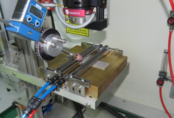 Laser System Configuration for Flat Titanium Samples